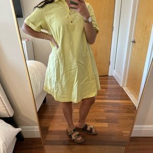 Yellow Vera Moda dress with snaps.